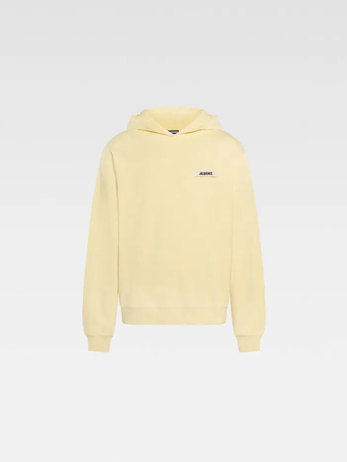 JACQUEMUS The Gros Grain Hoodie Light Yellow WomenMen Sweatshirts and Joggings JACQUEMUS The Gros Grain Hoodie Light Yellow WomenMen Sweatshirts and Joggings