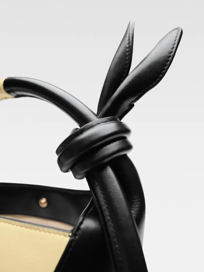 JACQUEMUS The Small Tourni Pale Yellow Black Women Crossbody and Handbags JACQUEMUS The Small Tourni Pale Yellow Black Women Crossbody and Handbags