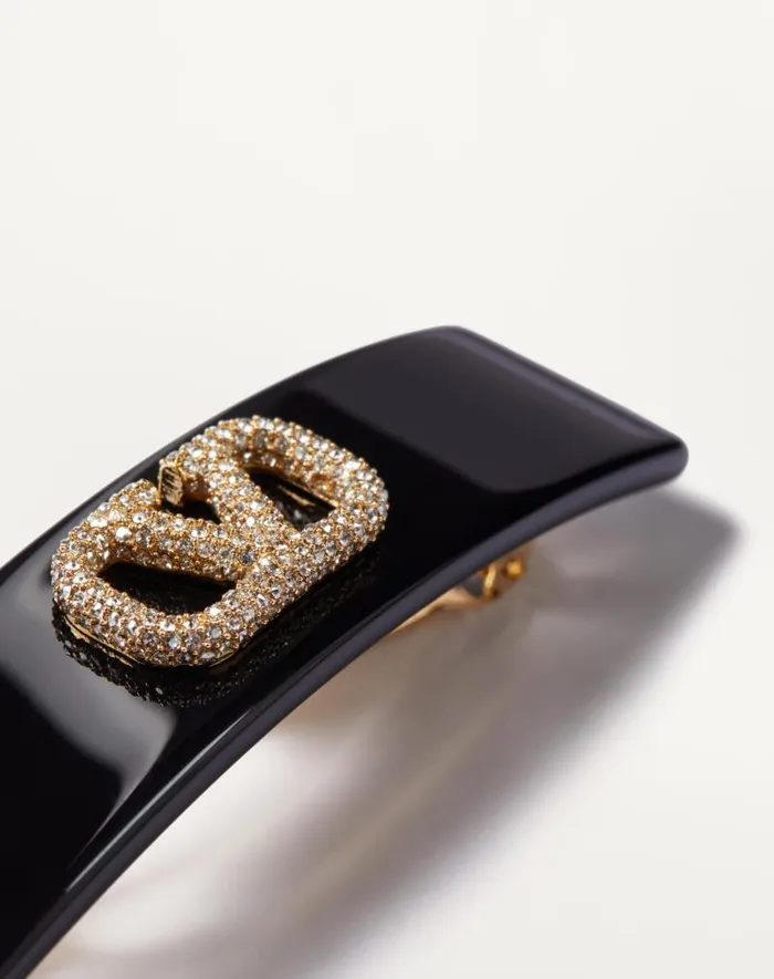 Valentino Hair Accessories Woman Vlogo Signature Metal And Resin Hair Clip With Swarovski Crystals For Woman In Blackgoldcrystal Blackgoldcrystal Valentino Hair Accessories Woman Vlogo Signature Metal And Resin Hair Clip With Swarovski Crystals For Woman In Blackgoldcrystal Blackgoldcrystal