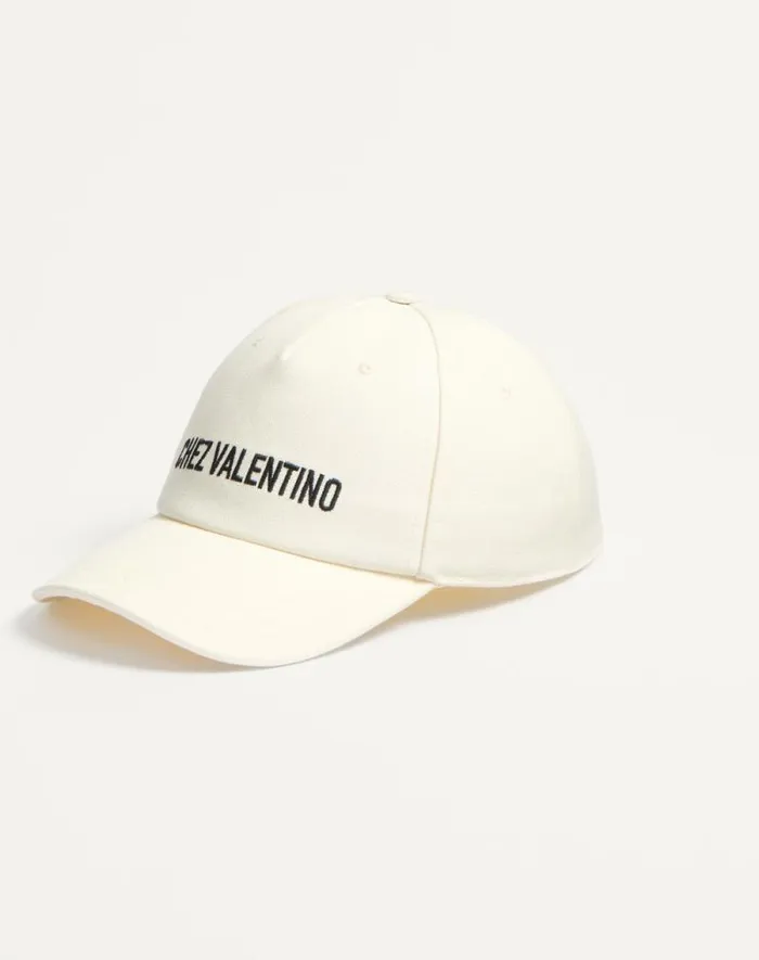 Valentino Hats And Gloves WomanMan Chez Valentino Cotton Baseball Cap With Embroidery For Man In Blackivory Blackivory Valentino Hats And Gloves WomanMan Chez Valentino Cotton Baseball Cap With Embroidery For Man In Blackivory Blackivory