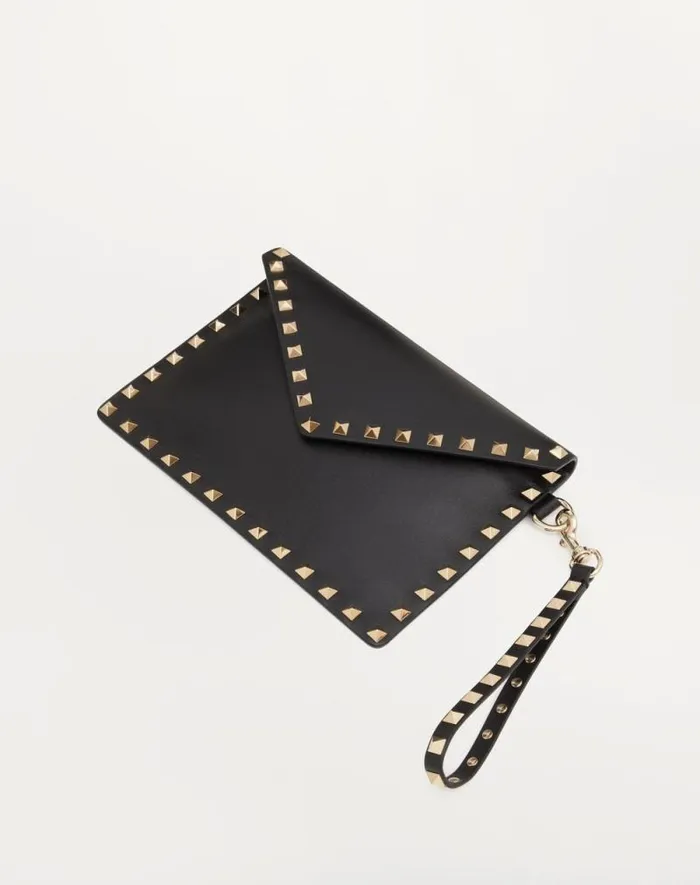 Valentino Mini Bags Woman Rockstud Calfskin Pouch For Woman In Poudre Poudre Valentino Mini Bags Woman Rockstud Calfskin Pouch For Woman In Poudre Poudre