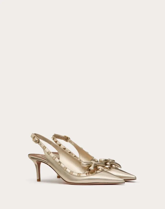 Valentino Pumps Woman Rockstud Bow Slingback Pumps In Laminated Nappa Leather And 60mm Tone Studs For Woman In Platinum Platinum