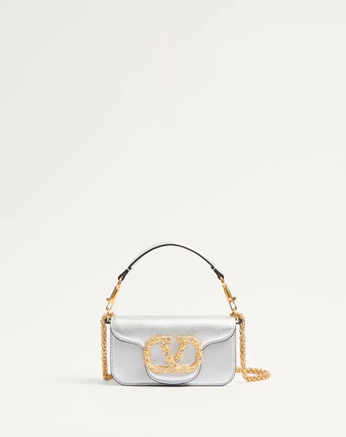 Valentino Shoulder Bags Woman Valentino Garavani Loc Small Shoulder Bag In Laminated Calfskin With Jewel Logo For Woman In Silvercrystal Silvercrystal Valentino Shoulder Bags Woman Valentino Garavani Loc Small Shoulder Bag In Laminated Calfskin With Jewel Logo For Woman In Silvercrystal Silvercrystal