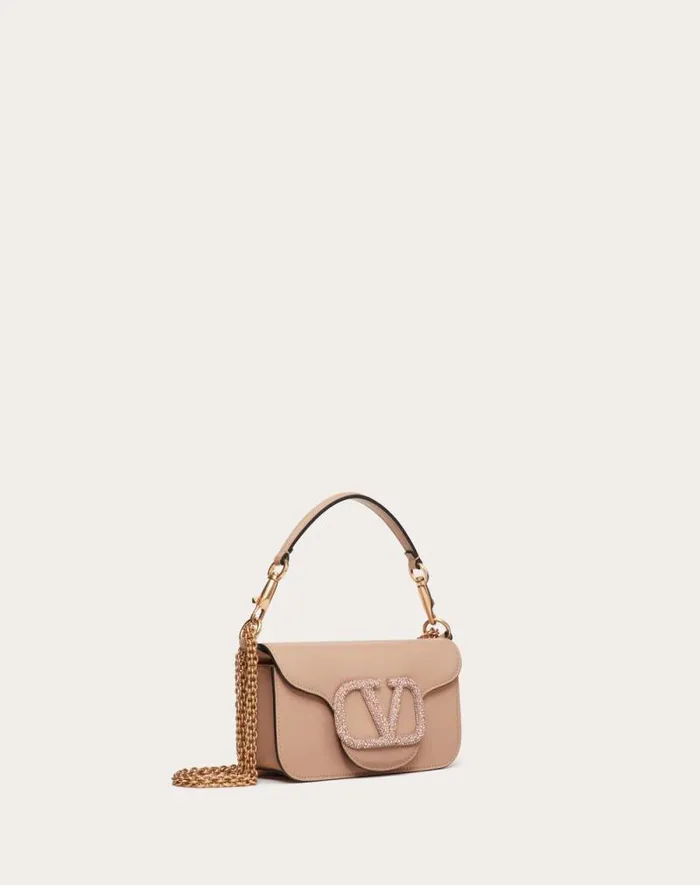 Valentino Shoulder Bags Woman Valentino Garavani Loc Small Shoulder Bag With Jewel Logo For Woman In Rose Cannelle Rose Cannelle Valentino Shoulder Bags Woman Valentino Garavani Loc Small Shoulder Bag With Jewel Logo For Woman In Rose Cannelle Rose Cannelle