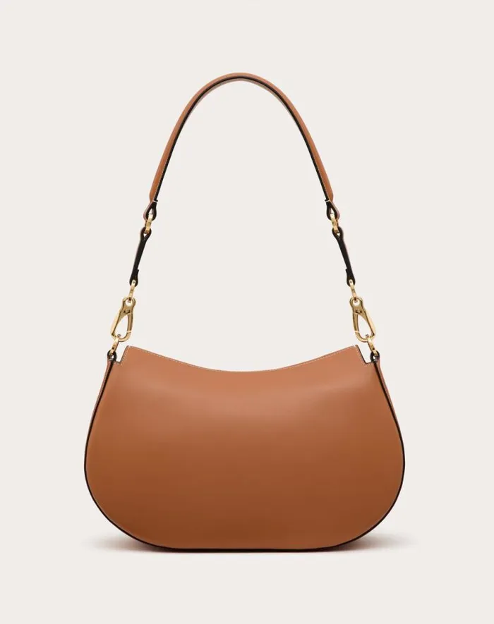 Valentino Shoulder Bags Woman Valentino Garavani Ohval Medium Shoulder Bag In Nappa Calfskin For Woman In Almond Almond Valentino Shoulder Bags Woman Valentino Garavani Ohval Medium Shoulder Bag In Nappa Calfskin For Woman In Almond Almond
