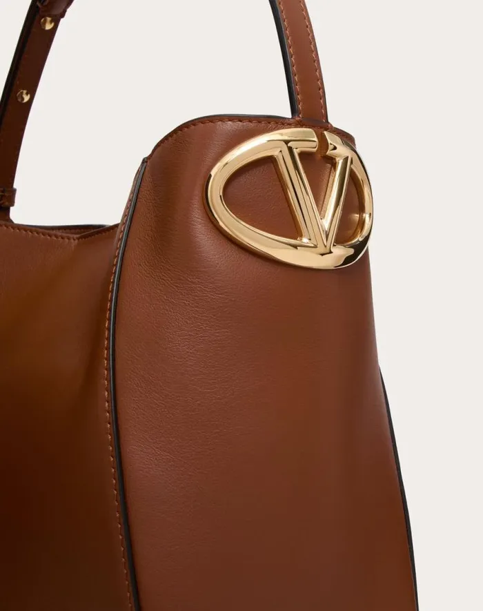 Valentino Shoulder Bags Woman Vlogo Side Bucket Bag In Nappa Calfskin For Woman In Tobacco Tobacco Valentino Shoulder Bags Woman Vlogo Side Bucket Bag In Nappa Calfskin For Woman In Tobacco Tobacco