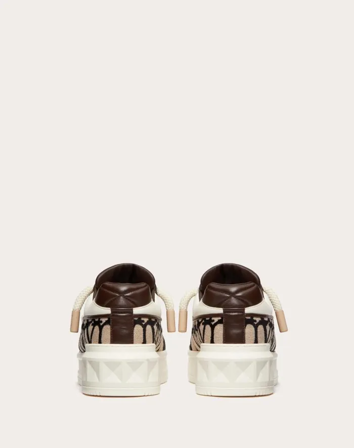 Valentino Sneakers Man One Stud Xl Lowtop Sneaker In Nappa Leather And Toile Iconographe Fabric For Man In Beigeblack Beigeblack Valentino Sneakers Man One Stud Xl Lowtop Sneaker In Nappa Leather And Toile Iconographe Fabric For Man In Beigeblack Beigeblack