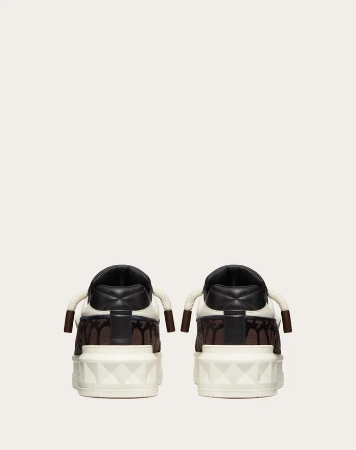 Valentino Sneakers Man One Stud Xl Lowtop Sneaker In Nappa Leather And Toile Iconographe Fabric For Man In Beigeblack Beigeblack Valentino Sneakers Man One Stud Xl Lowtop Sneaker In Nappa Leather And Toile Iconographe Fabric For Man In Beigeblack Beigeblack