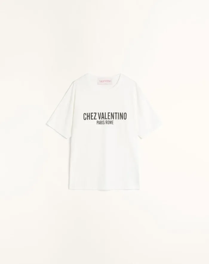 Valentino Tshirts And Sweatshirts Woman Jersey Cotton Tshirt With Chez Valentino Print For Woman In Ivory Ivory Valentino Tshirts And Sweatshirts Woman Jersey Cotton Tshirt With Chez Valentino Print For Woman In Ivory Ivory