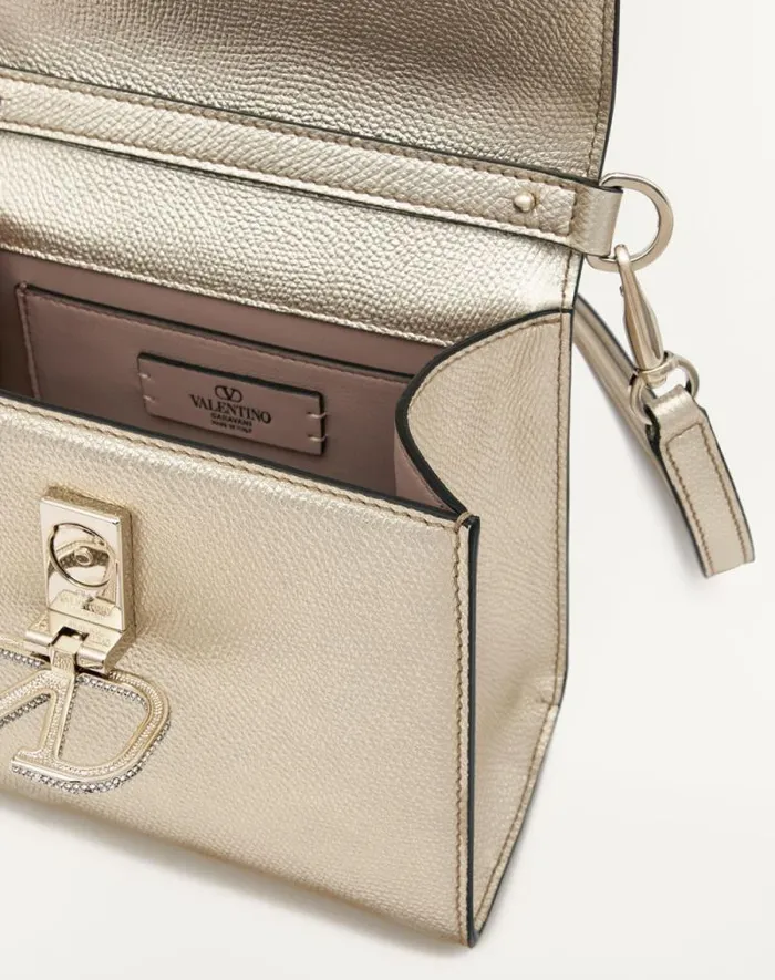 Valentino Top Handle Bags Woman Mini Vsling Handbag In Metallic Grainy Calfskin For Woman In Platinumcrystal Platinumcrystal Valentino Top Handle Bags Woman Mini Vsling Handbag In Metallic Grainy Calfskin For Woman In Platinumcrystal Platinumcrystal