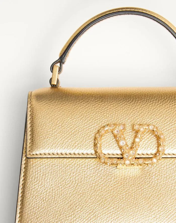 Valentino Top Handle Bags Woman Valentino Garavani Vsling Mini Handbag In Laminated Grainy Calfskin With Jewel Logo For Woman In Violet Violet Valentino Top Handle Bags Woman Valentino Garavani Vsling Mini Handbag In Laminated Grainy Calfskin With Jewel Logo For Woman In Violet Violet