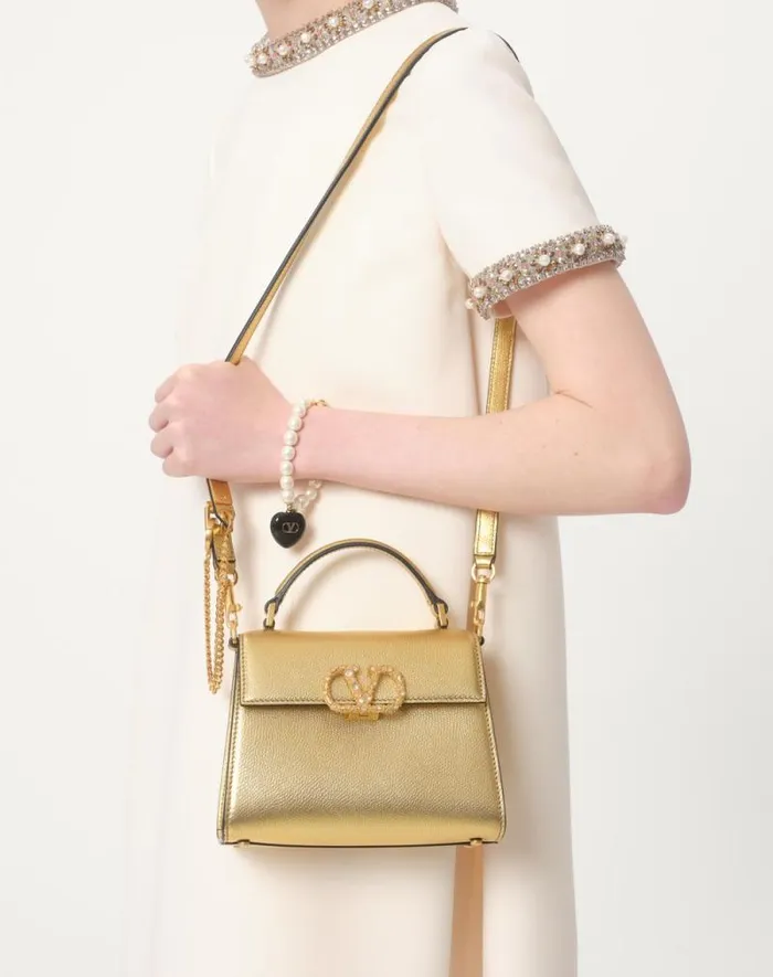 Valentino Top Handle Bags Woman Valentino Garavani Vsling Mini Handbag In Laminated Grainy Calfskin With Jewel Logo For Woman In Violet Violet Valentino Top Handle Bags Woman Valentino Garavani Vsling Mini Handbag In Laminated Grainy Calfskin With Jewel Logo For Woman In Violet Violet