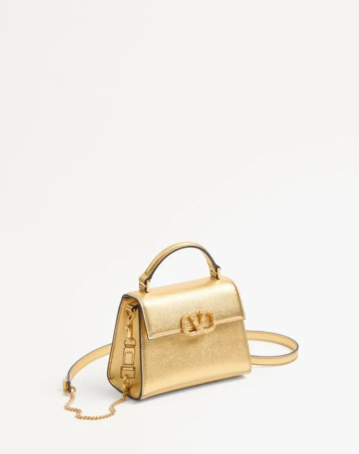 Valentino Top Handle Bags Woman Valentino Garavani Vsling Mini Handbag In Laminated Grainy Calfskin With Jewel Logo For Woman In Violet Violet Valentino Top Handle Bags Woman Valentino Garavani Vsling Mini Handbag In Laminated Grainy Calfskin With Jewel Logo For Woman In Violet Violet